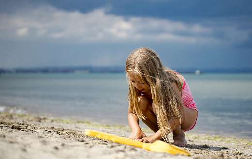 Beach kid sand play childhood