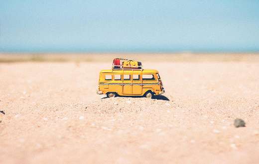 Yellow die cast miniature van