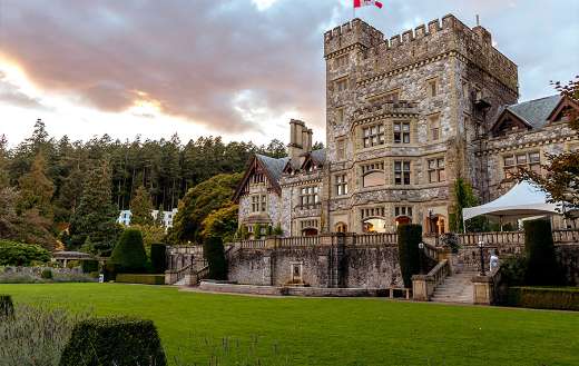 Stone castle with green grass front yard