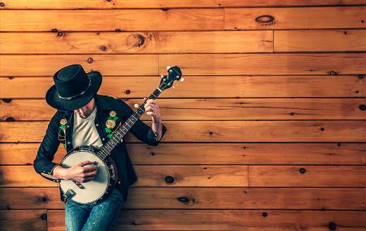 Musical instrument with man puzzle