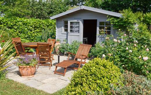 Gray shed with terrace online