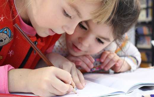 Kids studying puzzle