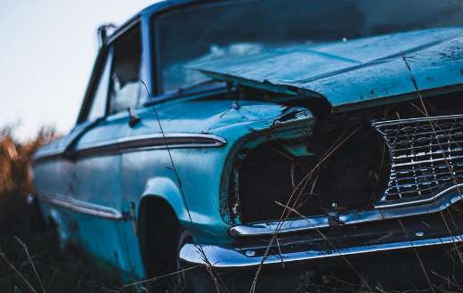 Blue car abandoned